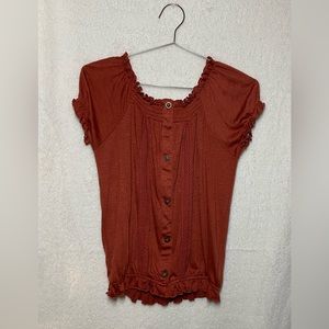 Can be a regular shirt or shoulder top.